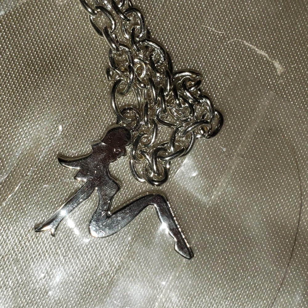 Sexy, Girl Silhouette Silver necklace. New in pack
